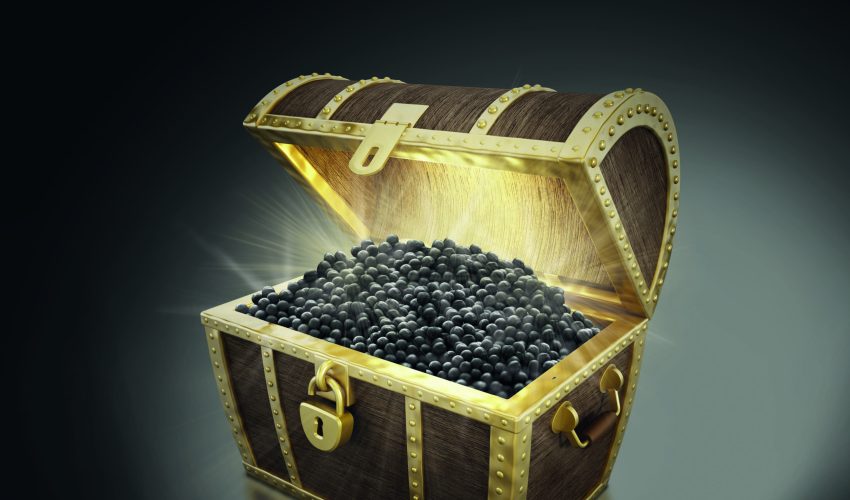 Treasure chest full of treasures. Texture on the coins is fictitious.